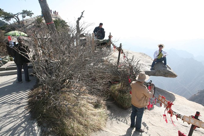Xian Day Trip to Mt. Huashan with Round-trip Cable Car - Taking the tourist bus to the cable car