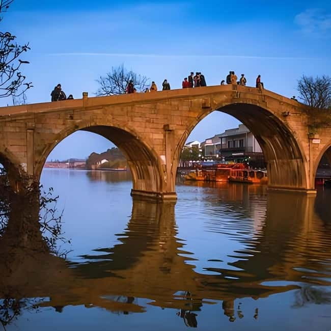 Yu Garden, Old Street, Bund & Zhujiajiao Water Town Bus Tour - Returning to Shanghai and reaching the Bund